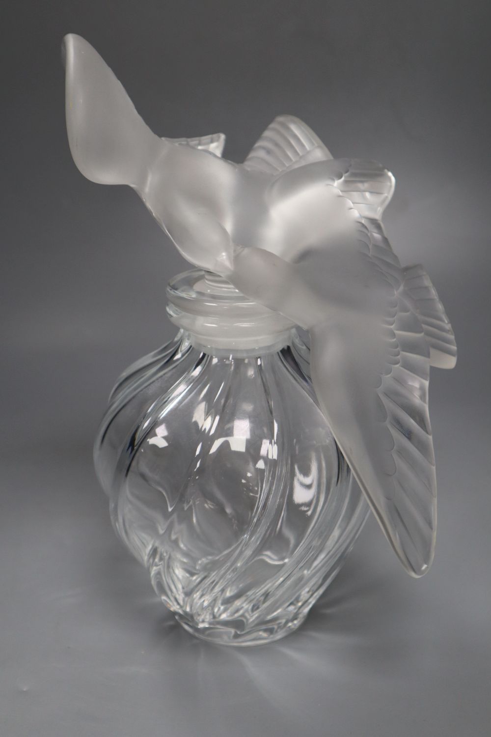 A Lalique Nina Ricci LAir du Temps perfume factice bottle, signed, height 31cm